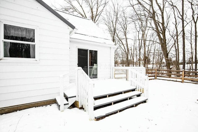 view of snow covered deck