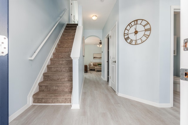 interior space with hardwood / wood-style flooring and ceiling fan