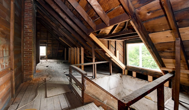 unfinished attic with plenty of natural light