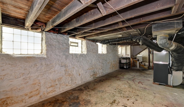 basement featuring heating unit