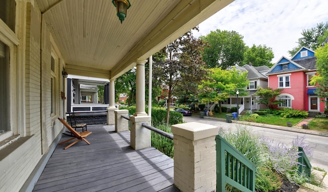 wooden deck featuring covered porch