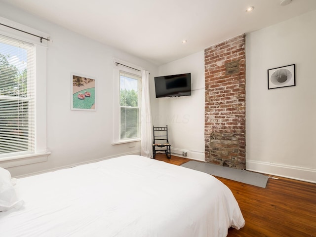 bedroom featuring hardwood / wood-style flooring