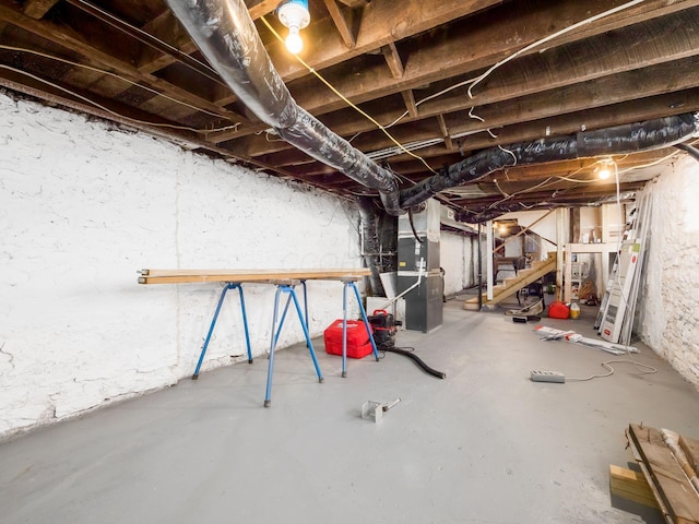 basement featuring heating unit