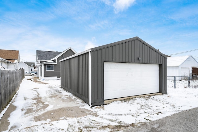 view of snow covered garage