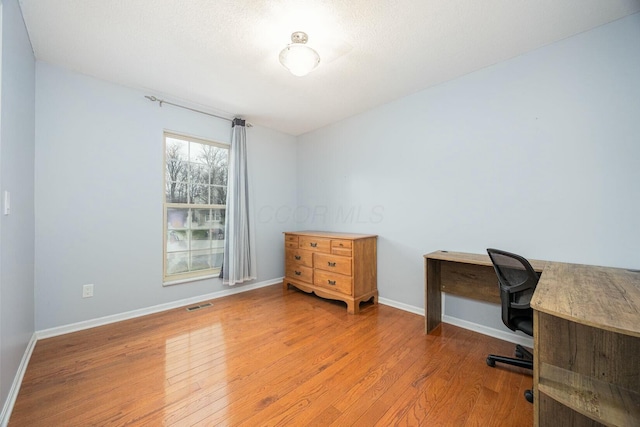 office space featuring light wood-type flooring