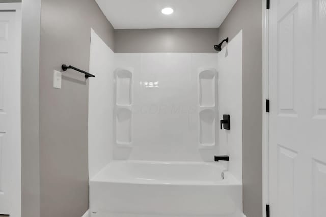 bathroom featuring washtub / shower combination