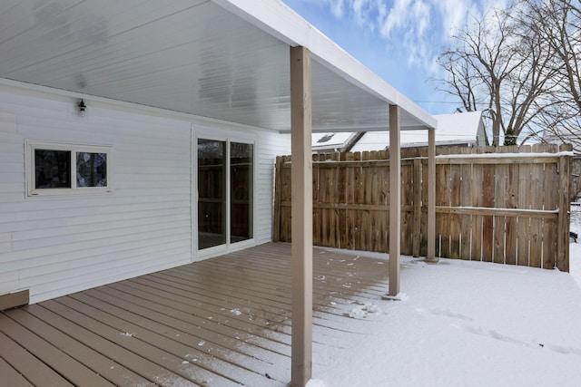 view of snow covered deck