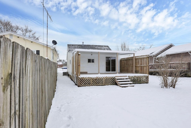 view of snow covered property