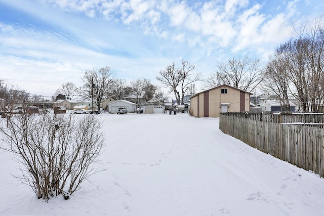 view of yard covered in snow