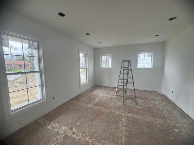 empty room with baseboards