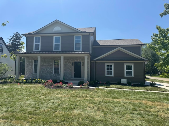 3519 Redding Rd, Columbus, OH 43221 - view of front facade featuring a front yard, covered porch, and brick siding