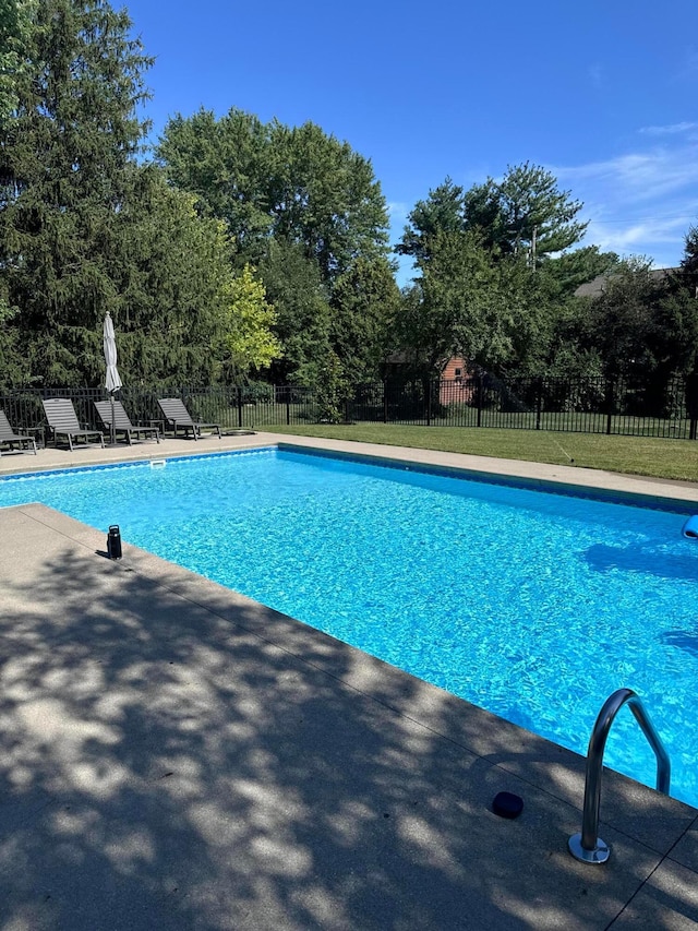 view of pool with a patio area, fence, and a fenced in pool