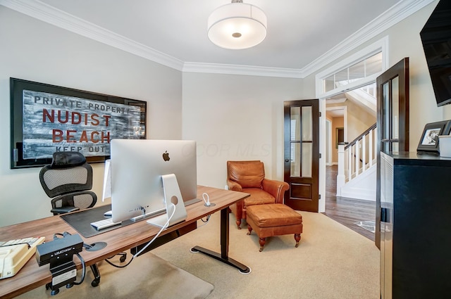 office area featuring french doors, crown molding, and wood finished floors