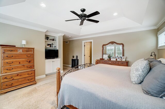 bedroom with light carpet, ornamental molding, a raised ceiling, and recessed lighting