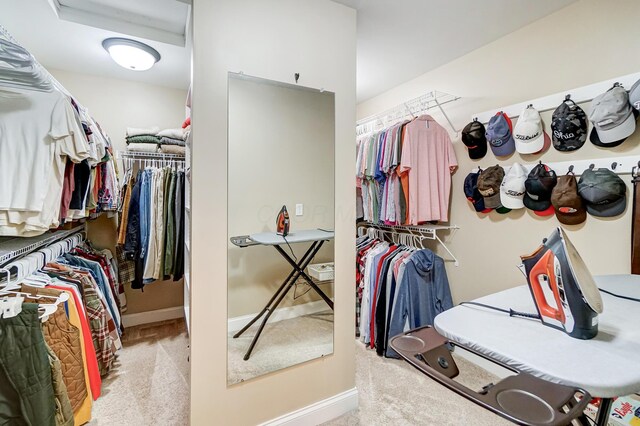 spacious closet featuring carpet