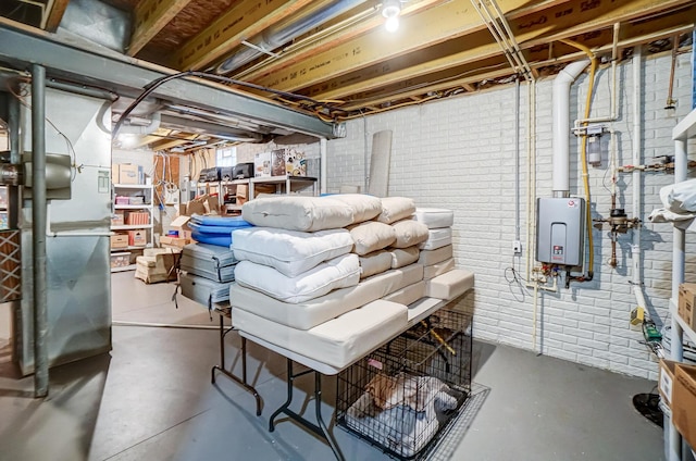 unfinished basement with water heater and brick wall