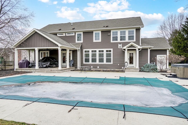 view of swimming pool with a patio, fence, a fenced in pool, and a hot tub