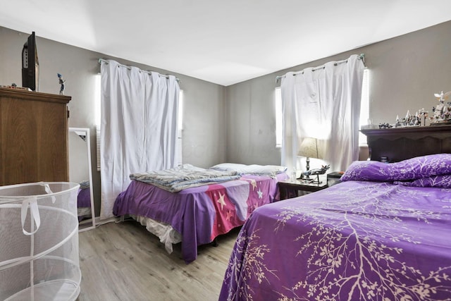 bedroom featuring light wood-type flooring