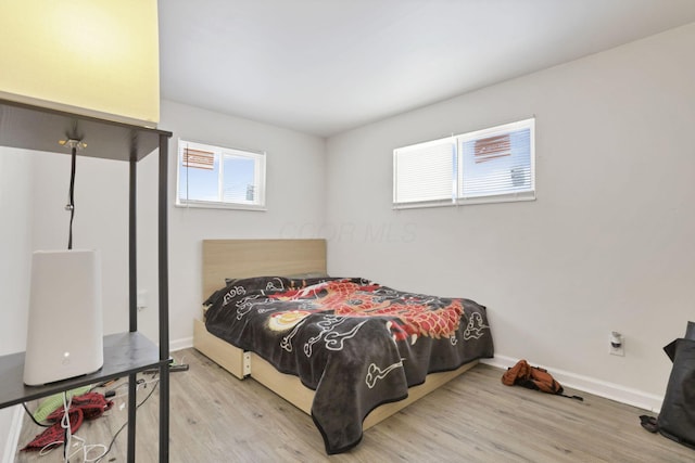 bedroom featuring light hardwood / wood-style flooring