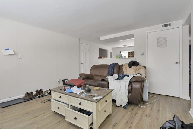 living room featuring light wood-type flooring