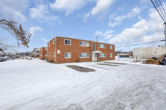 view of snow covered house