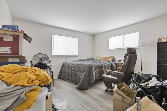 bedroom with light hardwood / wood-style floors