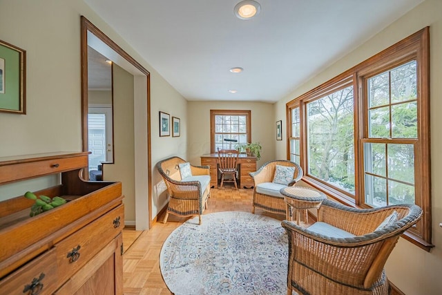 sitting room featuring light parquet floors