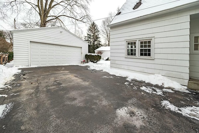 view of snow covered garage