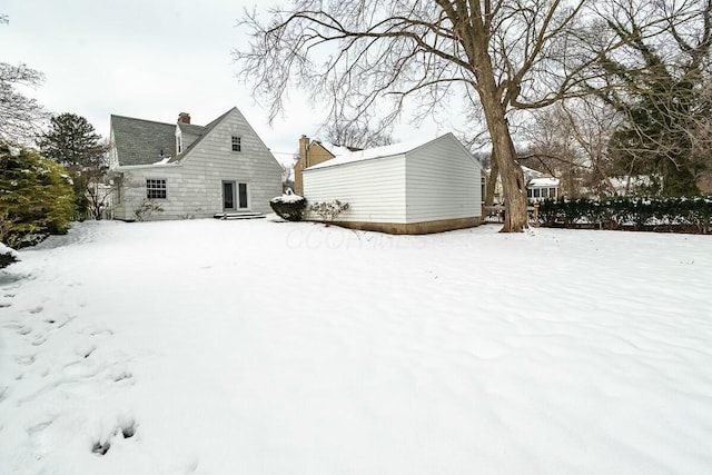 view of snow covered property