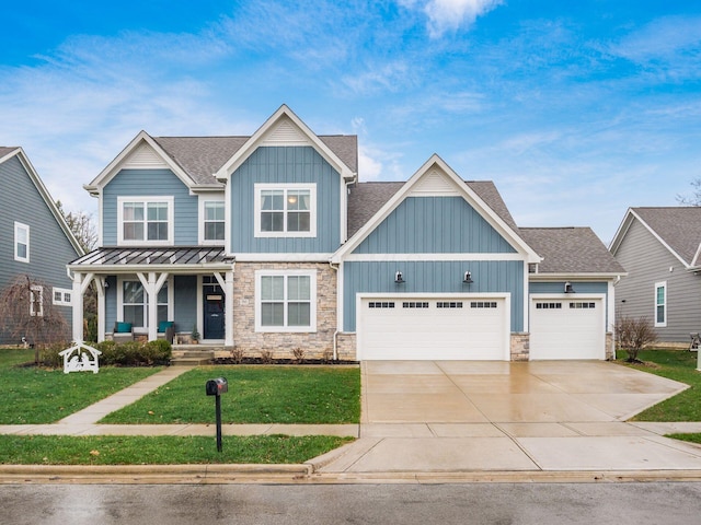 craftsman-style house with a garage, covered porch, and a front lawn