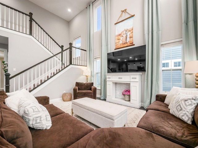 living room with a high ceiling