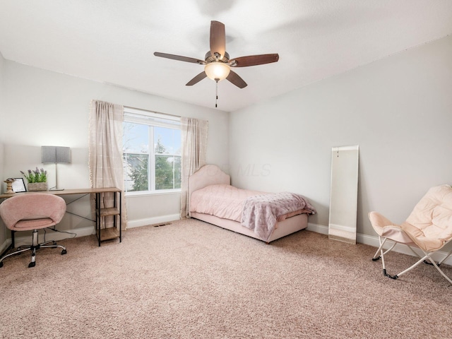 bedroom with ceiling fan and carpet