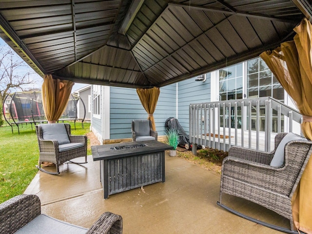 view of patio / terrace with a gazebo and a trampoline