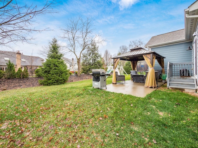 view of yard with a gazebo and a patio