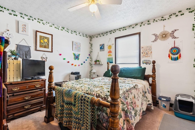 bedroom with carpet, ceiling fan, and a textured ceiling