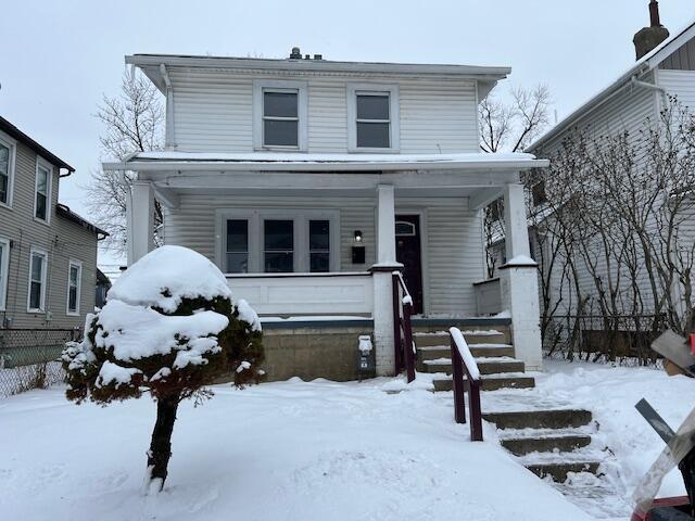 front of property with a porch