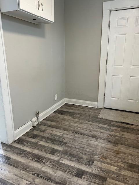 washroom with dark hardwood / wood-style flooring