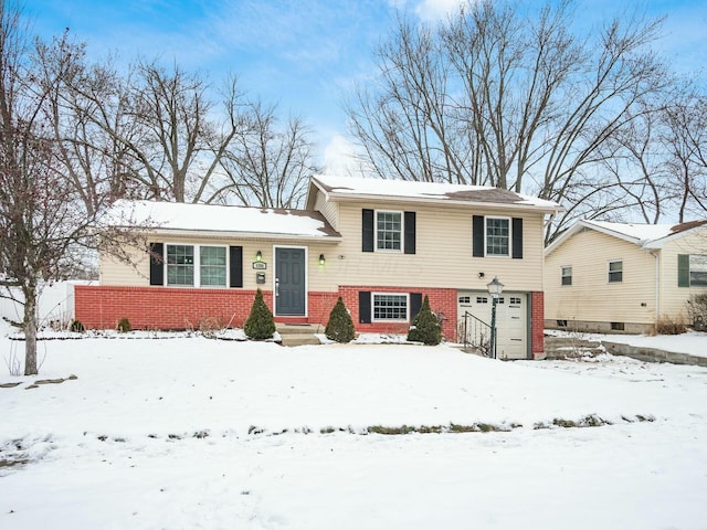 split level home with a garage