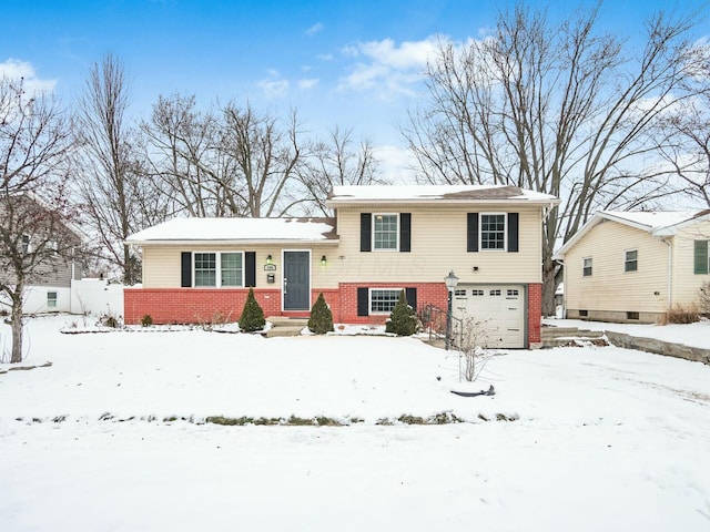 split level home with a garage