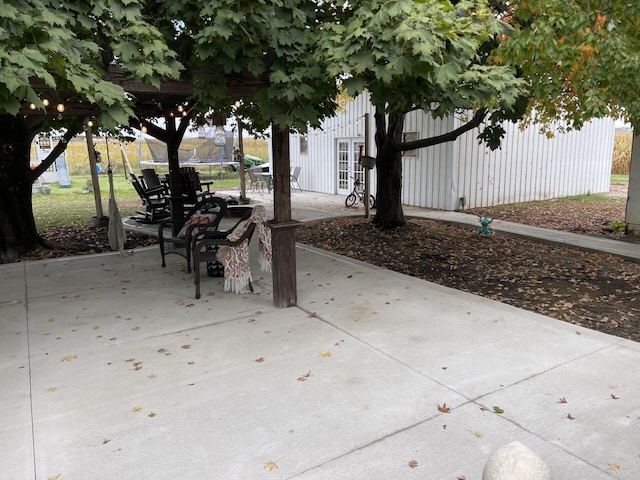 view of patio / terrace featuring a gazebo and a trampoline