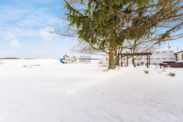 view of yard covered in snow