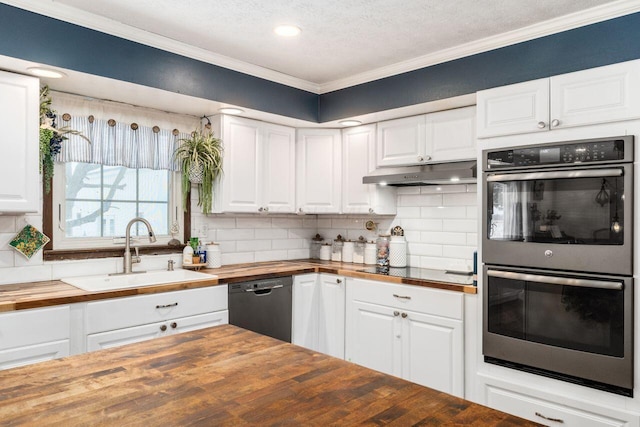 kitchen featuring wooden counters, stainless steel double oven, white cabinets, and dishwasher