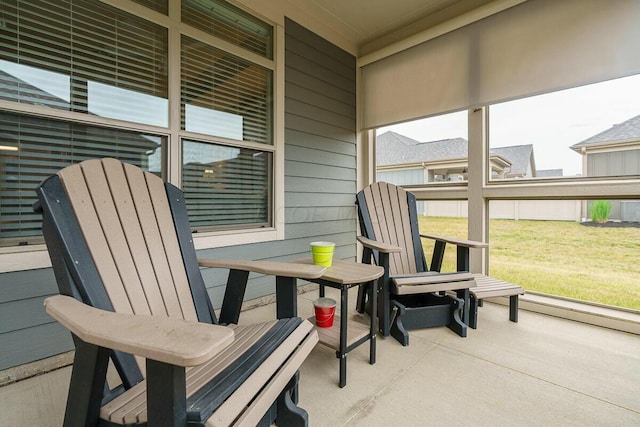 sunroom / solarium featuring a healthy amount of sunlight