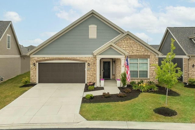 view of front of property with a garage and a front lawn