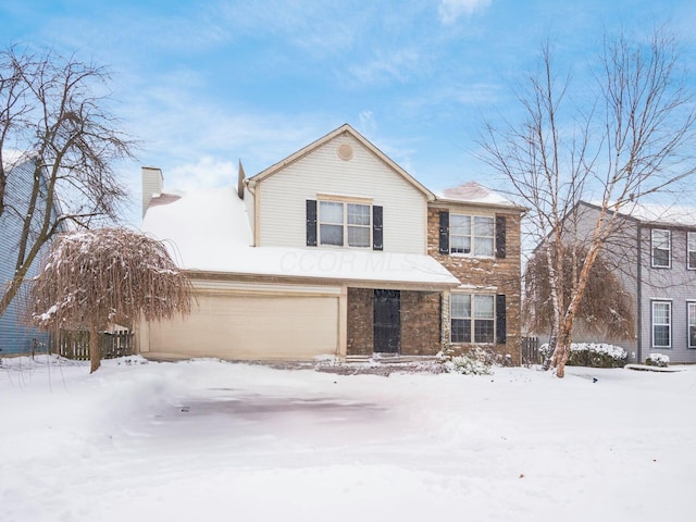 view of front property featuring a garage