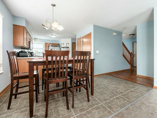 dining room with an inviting chandelier