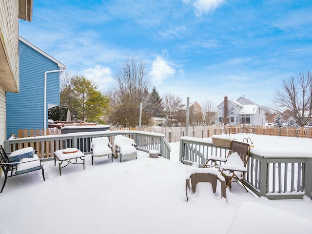 view of snow covered deck