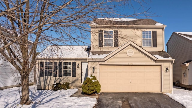 view of front of house with a garage