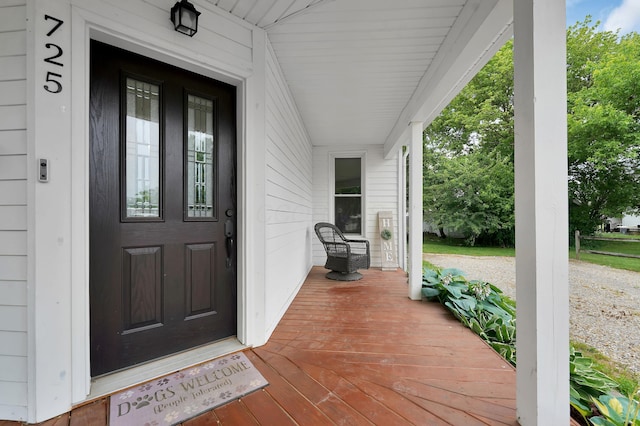 property entrance with a porch