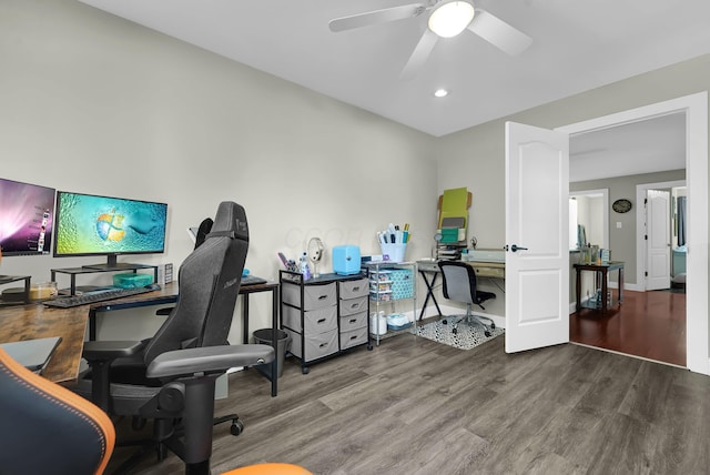 office area with wood-type flooring and ceiling fan